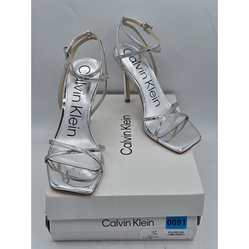 New - Calvin Klein Women's Tegin Heeled‎ Sandal, Silver 040 - size 7.5 M